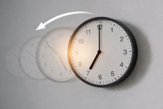 A close-up of a modern digital clock showing the transition from AM to PM for time subtraction.